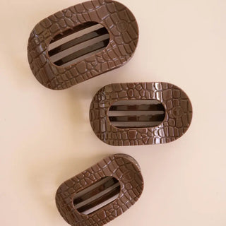 Teleties Brown Crocodile round flat hair clips.