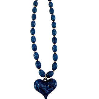 Navy blue beaded necklace with a heart-shaped pendant 