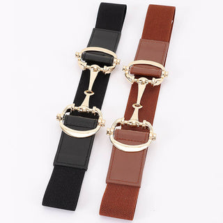 Two belts, one black and one brown, with gold bit buckles.