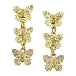A pair of gold-tone drop earrings each featuring three textured butterfly charms connected by chain links in a cascading vertical arrangement.