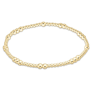 Enewton's Hope Unwritten 3MM delicate gold beaded bracelet with alternating large and small polished beads.