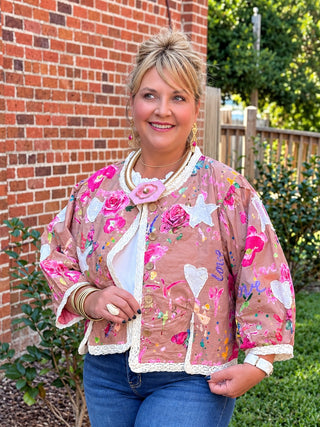 lightweight cotton jacket, detailed with lace trim, heart and star appliqués, and natural wooden buttons.