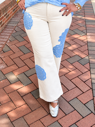 Whispering Petals Pants feature a flattering wide-leg, high-waist silhouette with intricate floral lace appliques