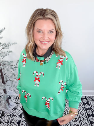 green candycane sweatshirt