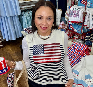 The queen of sparkles American flag striped tank.