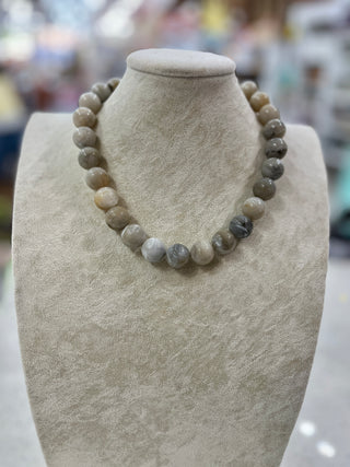 Gray marbled beaded necklace.