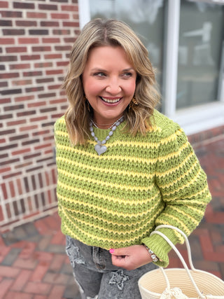 green and yellow knit sweater