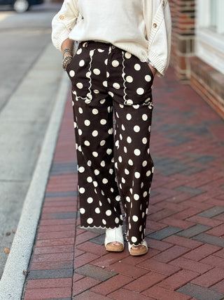 brown and ivory pants, featuring polka dots and scallop trim in a wide-leg silhouette
