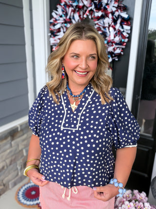 white and navy polka dot blouse