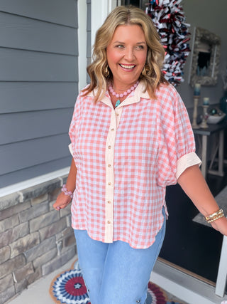 pink and white checkered blouse