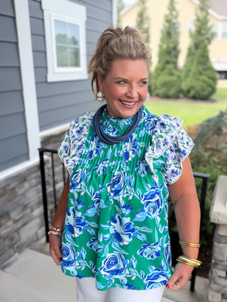 blue and green floral blouse