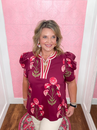 wine colored blouse with floral print, balloon sleeve, striped v-neck color