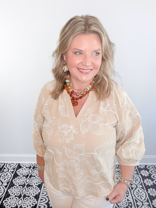 cream embroidered blouse