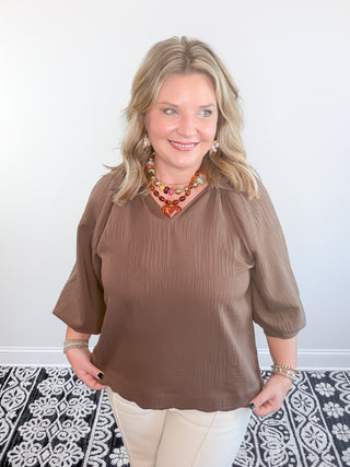 brown textured blouse