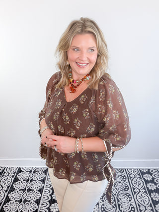 brown floral blouse