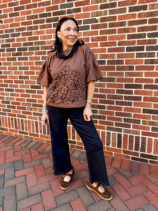 Brown French terry crewneck top with black flower embroidery 