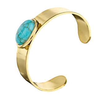 Gold bracelet with a turquoise stone by Susan Shaw.