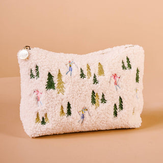 White textured pouch with embroidered Christmas trees and figures