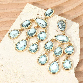 Gold and aqua gemstone chandelier statement earrings. 