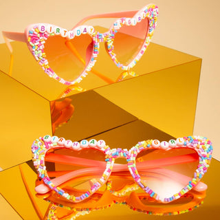 Pink sunglasses with 'Birthday Girl' decoration.