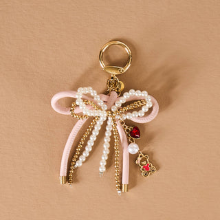 Decorative keychain/Bagcharm with pink ribbon, pearls, and charms 