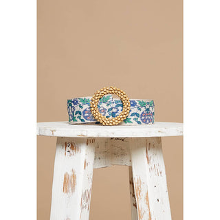Decorative belt with floral pattern and bead buckle.