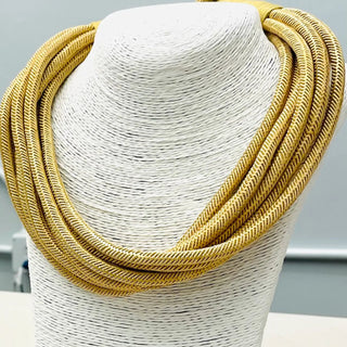 Tan rope statement necklace.