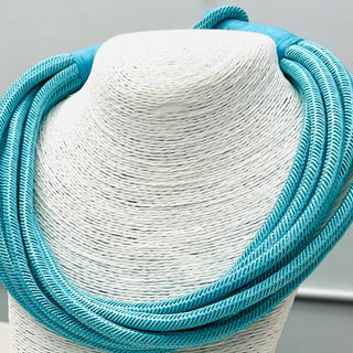Turquoise rope statement necklace.