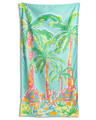 Colorful beach towel with palm tree design.