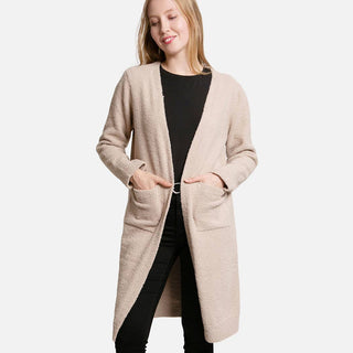 Woman wearing a beige long cardigan 