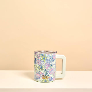 Coastal-patterned insulated 140z mug with a handle.