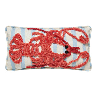 Pillow with a red lobster design on a striped background