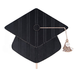 Black graduation cap with a tassel decorative topper.