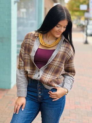 brown, burgundy, and cream plaid shirt with collar