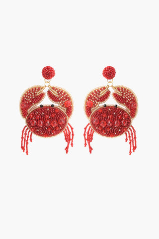 Red crab-shaped beaded earrings with gold accents.