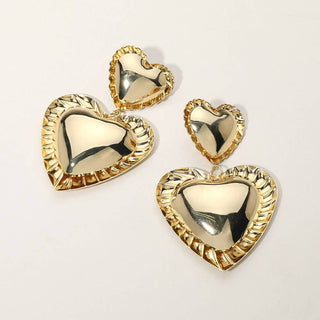 Gold heart-shaped earrings 