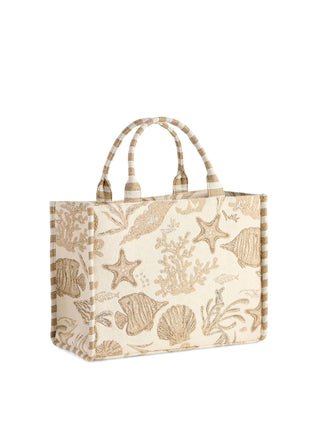 Beige tote bag with beach-themed design.