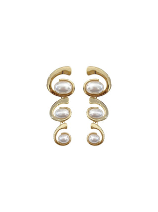 Pair of gold earrings with pearl-like stones.