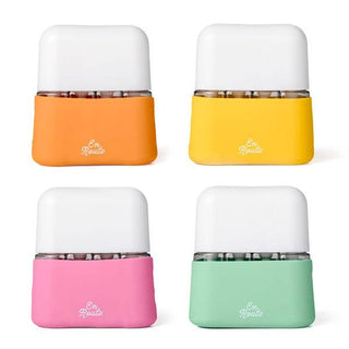 Four colorful TSA approved travel container set.
