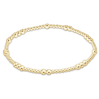 Enewton's Hope Unwritten 3MM delicate gold beaded bracelet with alternating large and small polished beads.