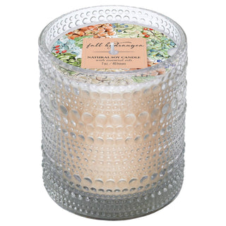 Fall Hydrangea candle in a textured glass holder with a decorative label.