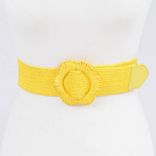 Yellow stretch belt with a floral buckle.