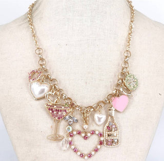 Gold heart charm necklace