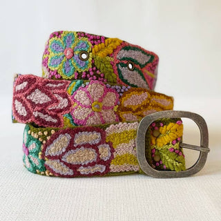 Colorful embroidered belt with floral patterns.