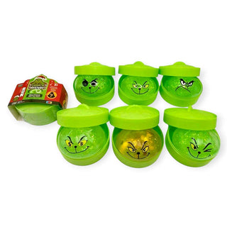 Six Grinch-themed squishy dumplings.