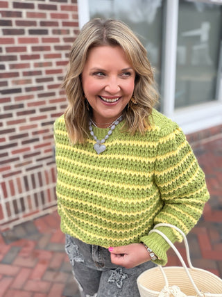 green and yellow knit sweater