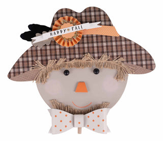 Decorative scarecrow topper with a plaid hat, bow tie, and 'Happy Fall' sign.