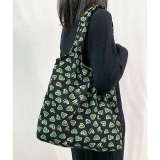 Heart pattern slouchy tote bag.