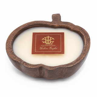 Pumpkin-shaped candle with a pumpkin vanilla scent.