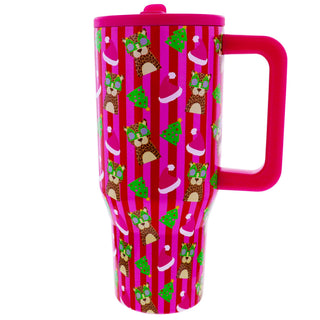 A pink insulated travel mug with a lid and handle, decorated with a pattern of brown leopards wearing green sunglasses and Santa hats on pink and red vertical stripes.